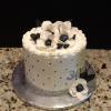9" Butter Almond Pound Cake
Vanilla ButterCream Filling/Frosting
Decoration:  Black/White and Silver