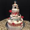Winter 'Onederland' Birthday Cake
3 Tiers With Igloo Topper (Serves 60) Chocolate Fudge Cake, Vanilla Pound Cake, White Chocolate Cake 
Fondant Decorations: Pigeons, Polar Bears, Snowflakes, Stripes, Lolly Pops, etc
