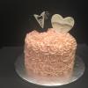 9" Strawberry Cake with Strawberry Cream Cheese Filling and Champagne ButterCream Frosting
Decoration:  Fondant Bride and Groom Hearts