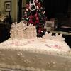 Beautiful White Christmas Cake.  Double Layer Butter Almond Cake with Raspberry Filling and Butter Cream Frosting.  