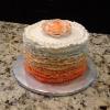 This is a Spring Celebration Cake.  It is a Poppy Seed Cake with Orange Buttercream. 