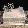 This is a birthday cake for a 3 year old little girl.  It is a stawberry cake inspired by Disney's  "Frozen". 